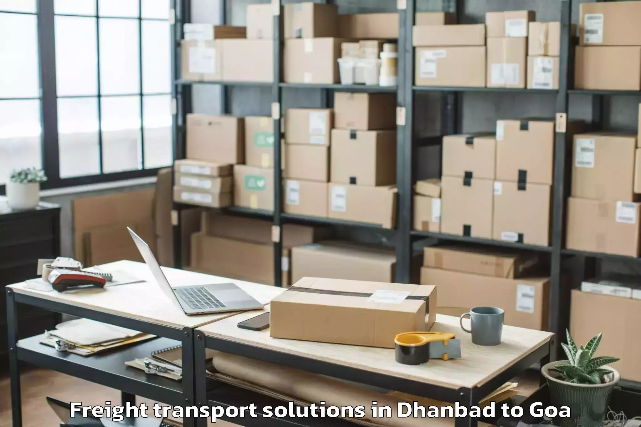 Book Dhanbad to Aldona Freight Transport Solutions